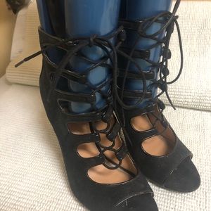 Black suede lace up open toed shoes